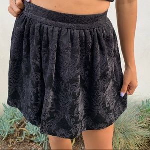 Black velvet high-waisted skirt